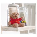 Ours peluche publicitaire GARLICKS sur une table