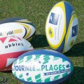 Ballon rugby publicitaire BRIVES PVC lisse sur pelouse