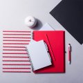 CARNET DE NOTES PUBLICITAIRE PAWNEE sur un bureau