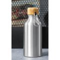 Gourde alu publicitaire BAGWELL 400 ml sur une table
