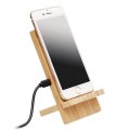 Support avec téléphone en mode chargeur induction