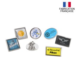 Pin's publicitaire en zamac ETOILE ovale